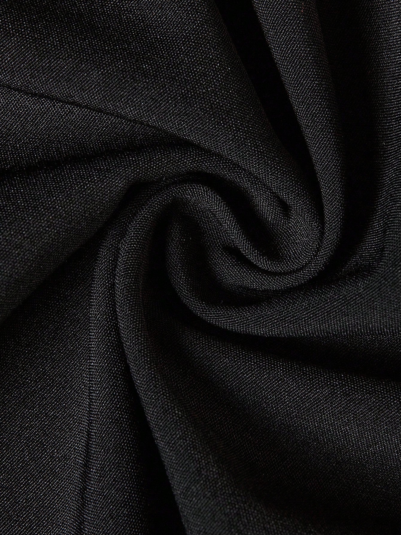 "Close-up detail of Queen's Gambit dress pattern and fabric texture"
