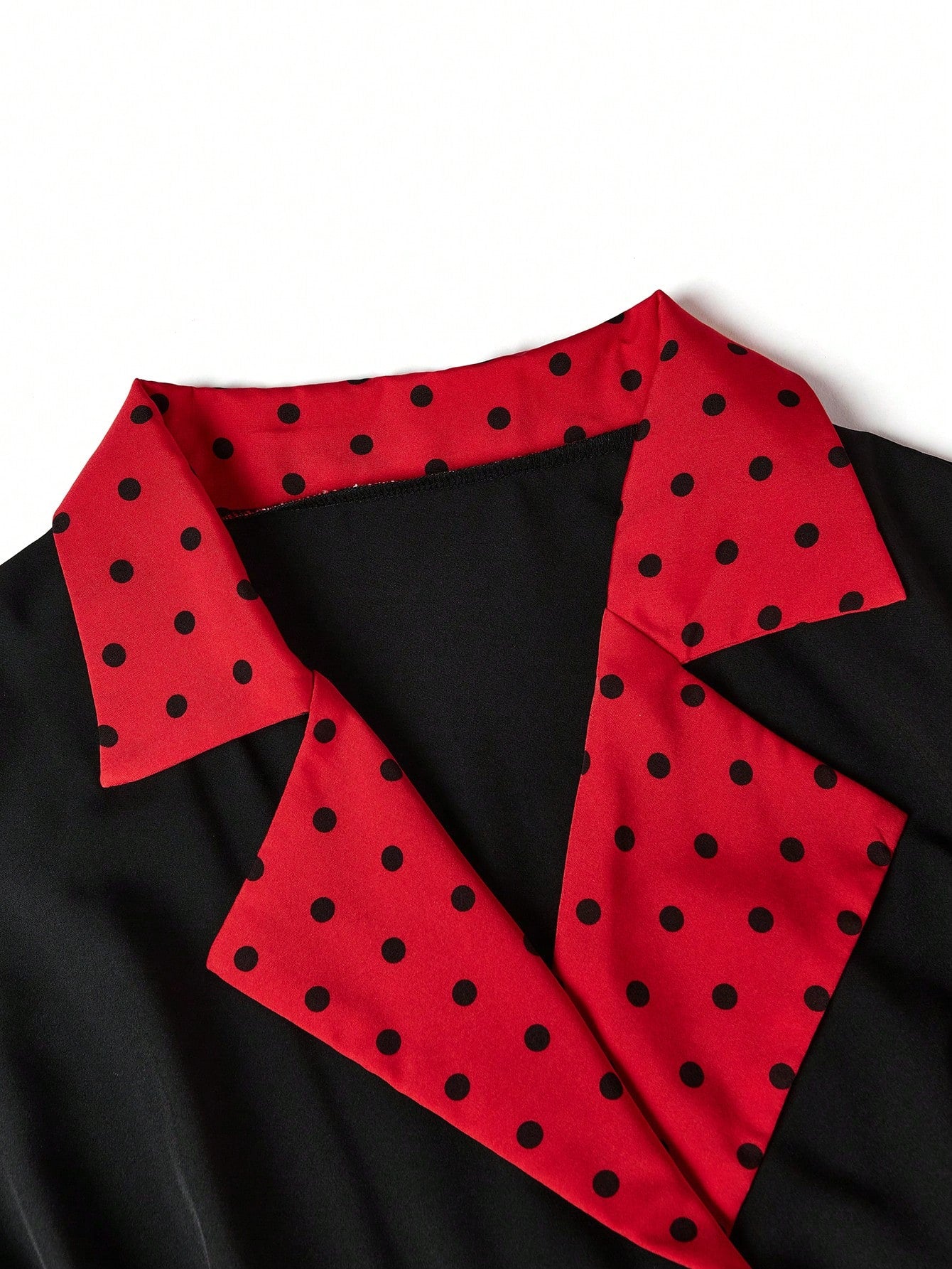 "Close-up detail of Queen's Gambit dress pattern and fabric texture"
"Side view of vintage-style Queen's Gambit dress showing fit and flare design"