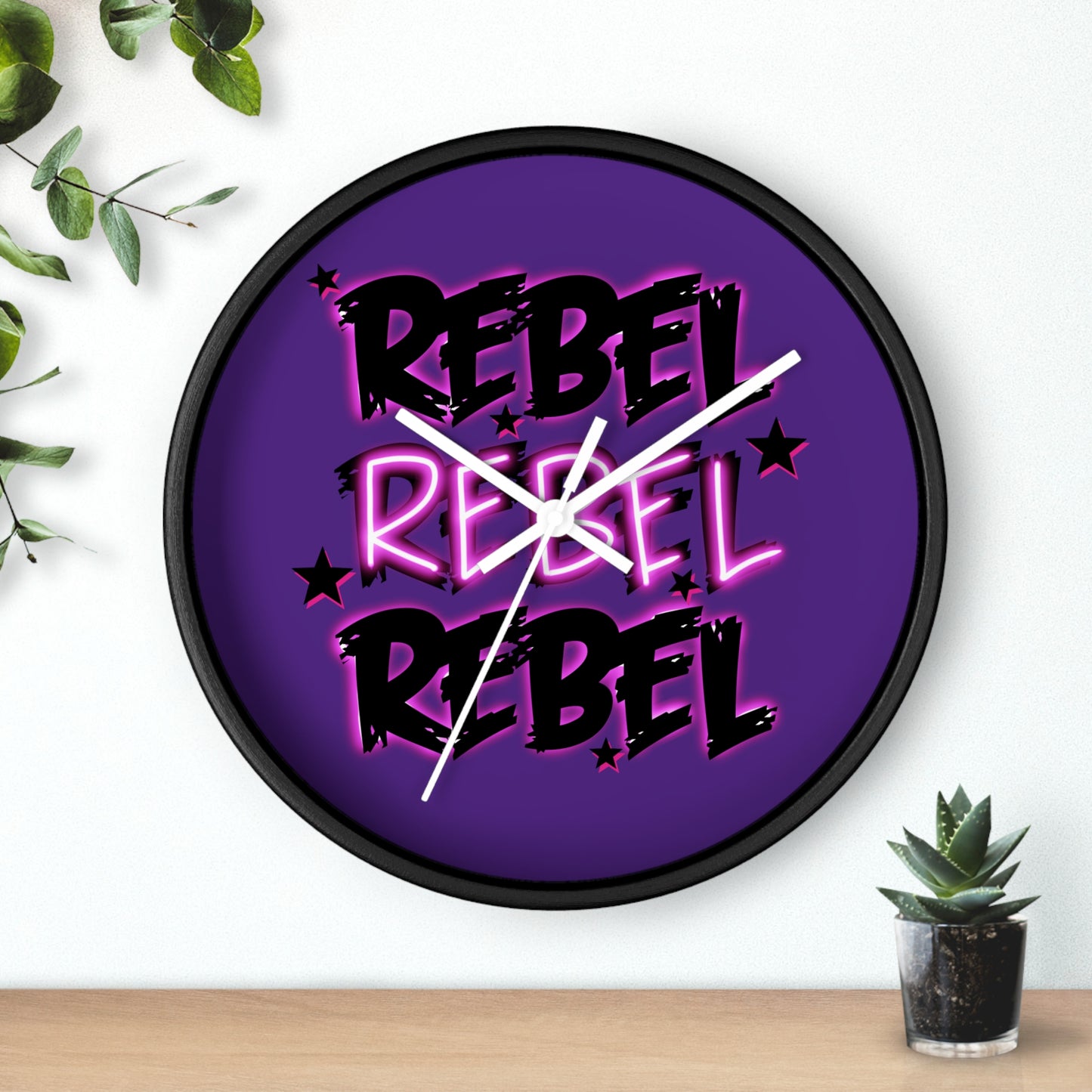 Rock and roll inspired wall clock with REBEL text - music lover's home decor featuring bold design and modern style