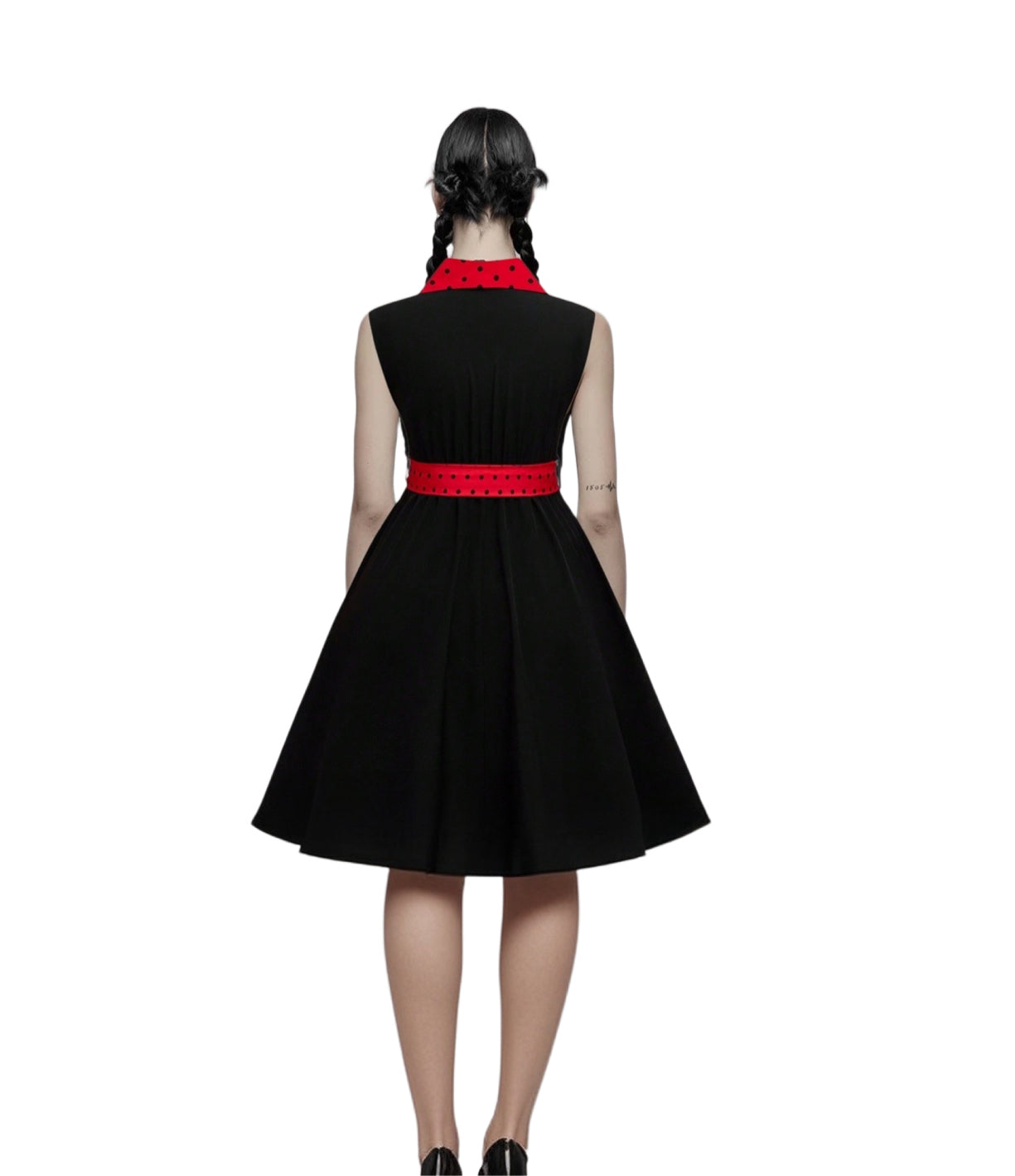 "Back view of Model wearing Queen's Gambit dress, showcasing size-inclusive fit and movement"