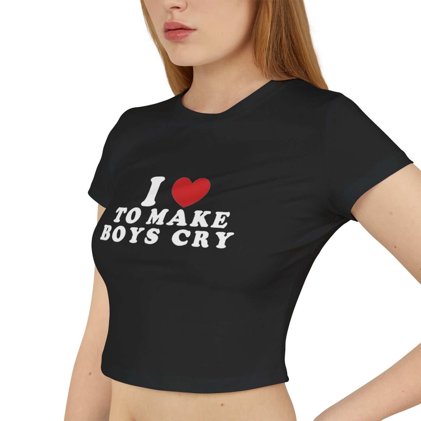 "Close-up of 'I Love to Make Boys Cry' text design showing clear print quality on black baby tee"
"Side view of fitted baby tee showing cropped length and flattering cut for all sizes S-5XL"
"Alternative fashion model wearing statement baby tee paired with high-waisted jeans"
"Back view of empowerment statement tee showing overall fit and fabric quality"
"Detail shot of shirt fabric showing soft material texture and comfortable stretch"