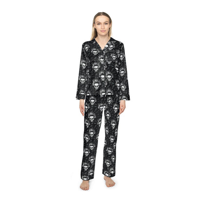 Luxurious black satin pajama set with edgy skull print pattern, showing full length pants and long sleeve button-up top