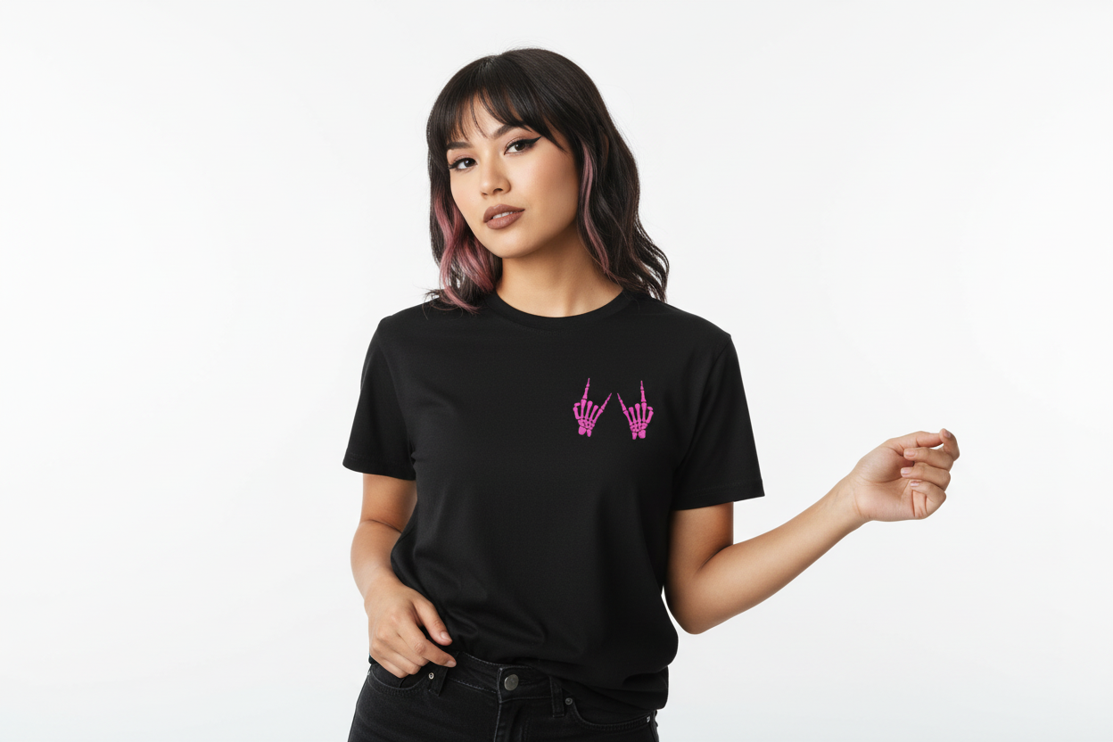 Person wearing a black t-shirt with pink graphics on a white background