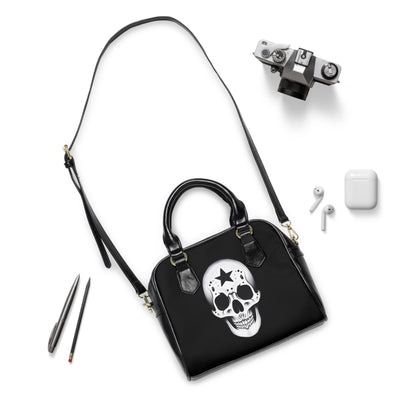 Rascal gothic handbag with edgy gothic motif
Alternative fashion gothic purse with rebellious design
Edgy punk rock handbag with structured silhouette
