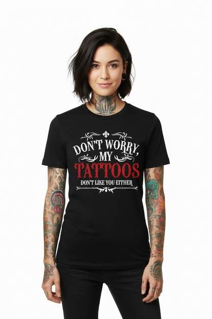 Person wearing a black t-shirt with a humorous tattoo-themed design.
