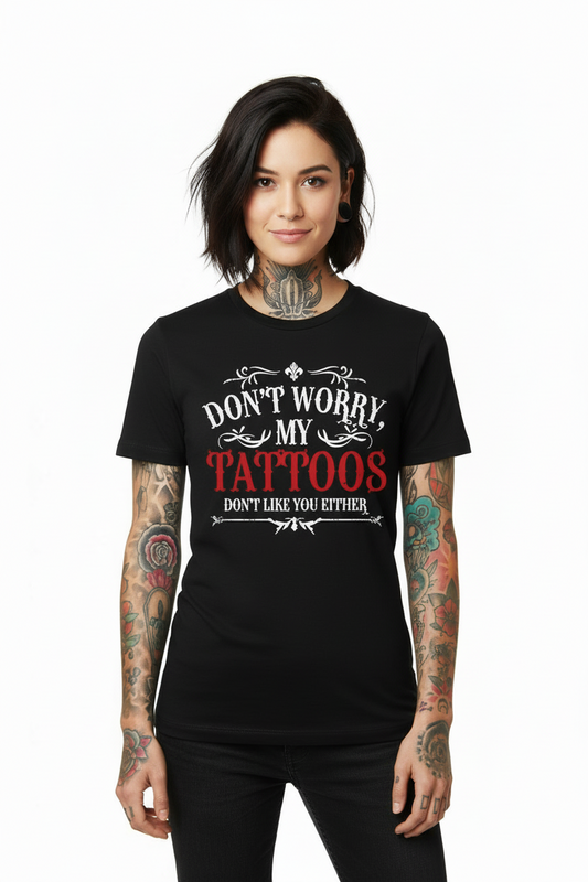 Person wearing a black t-shirt with a humorous tattoo-themed design.