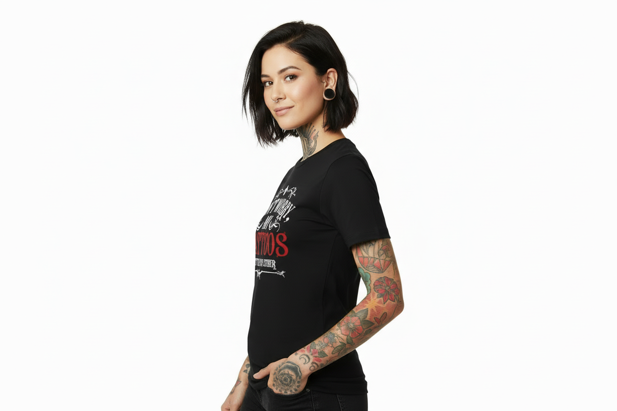 Person wearing a black t-shirt with a graphic design on a white background