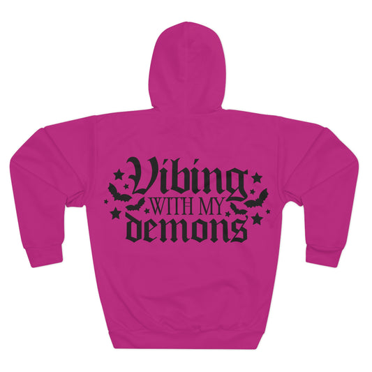 Pink hoodie with 'Viking with my demons' text on the back against a white background