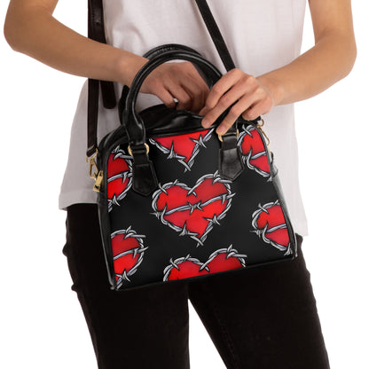 Barbed Heart gothic handbag with barbed-wire motif

