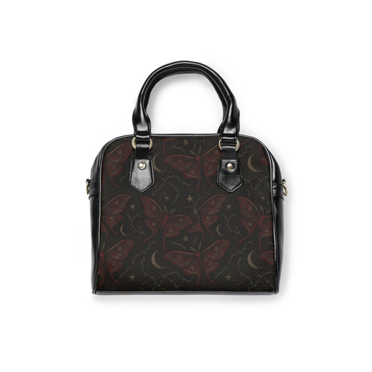 Dark Romance Butterflies gothic handbag with butterfly motif
Alternative fashion gothic purse in structured silhouette
Edgy punk rock handbag with gothic butterfly design