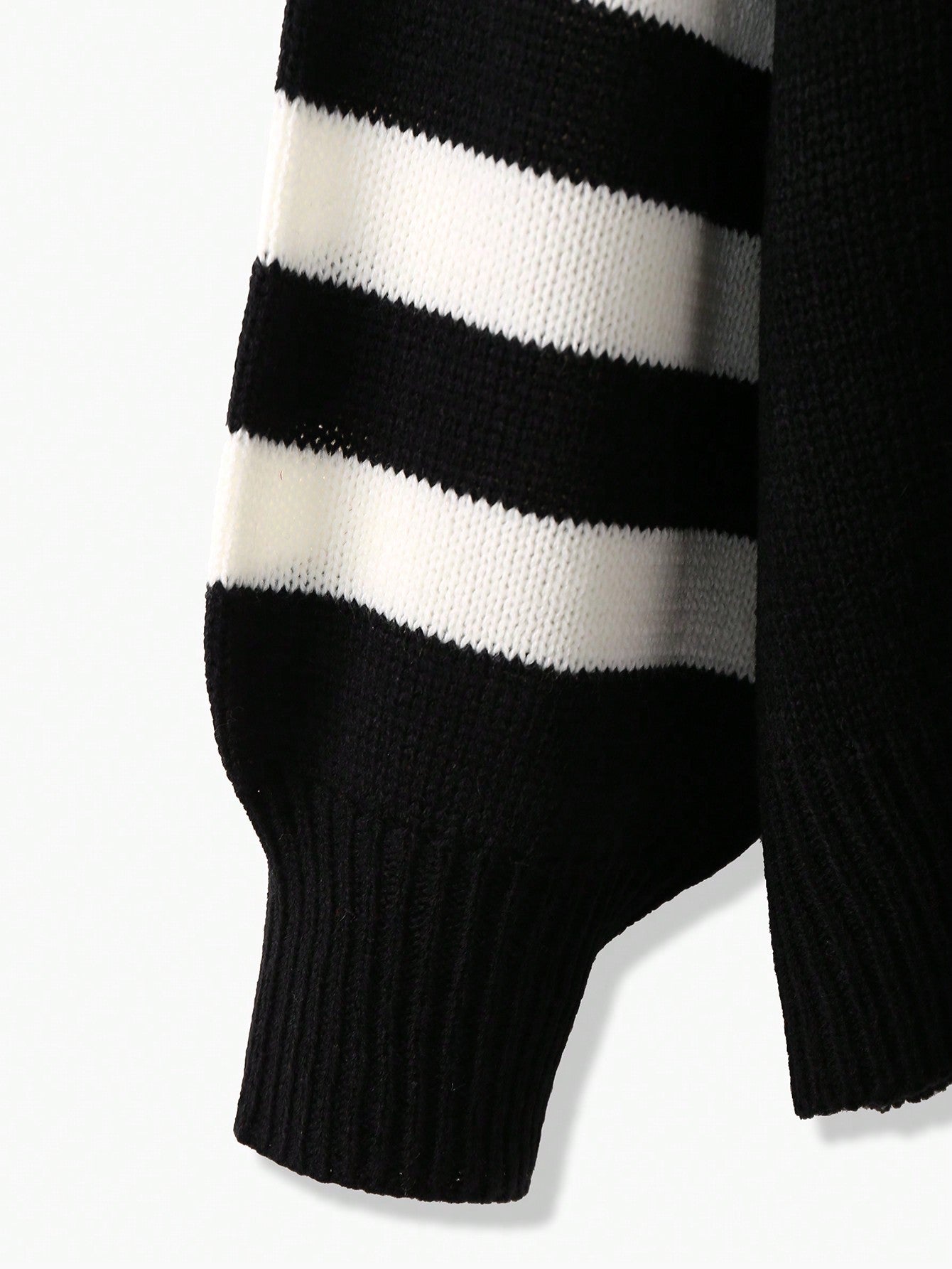 Alternative black sweater with white hearts - cozy fashion featuring long sleeves and inclusive sizing S-5XL