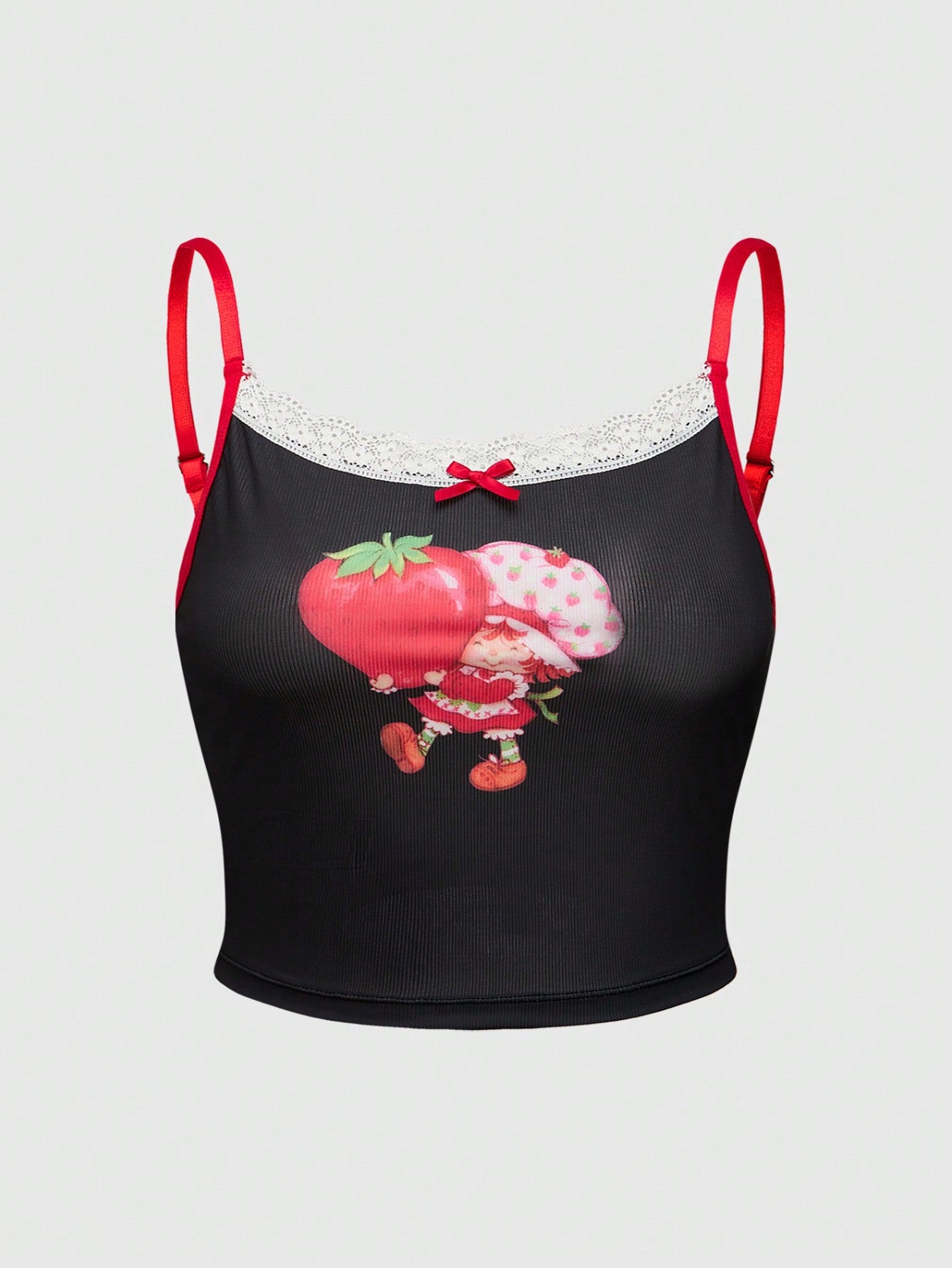 Loungewear top close-up showing detailed strawberry print pattern and fabric texture