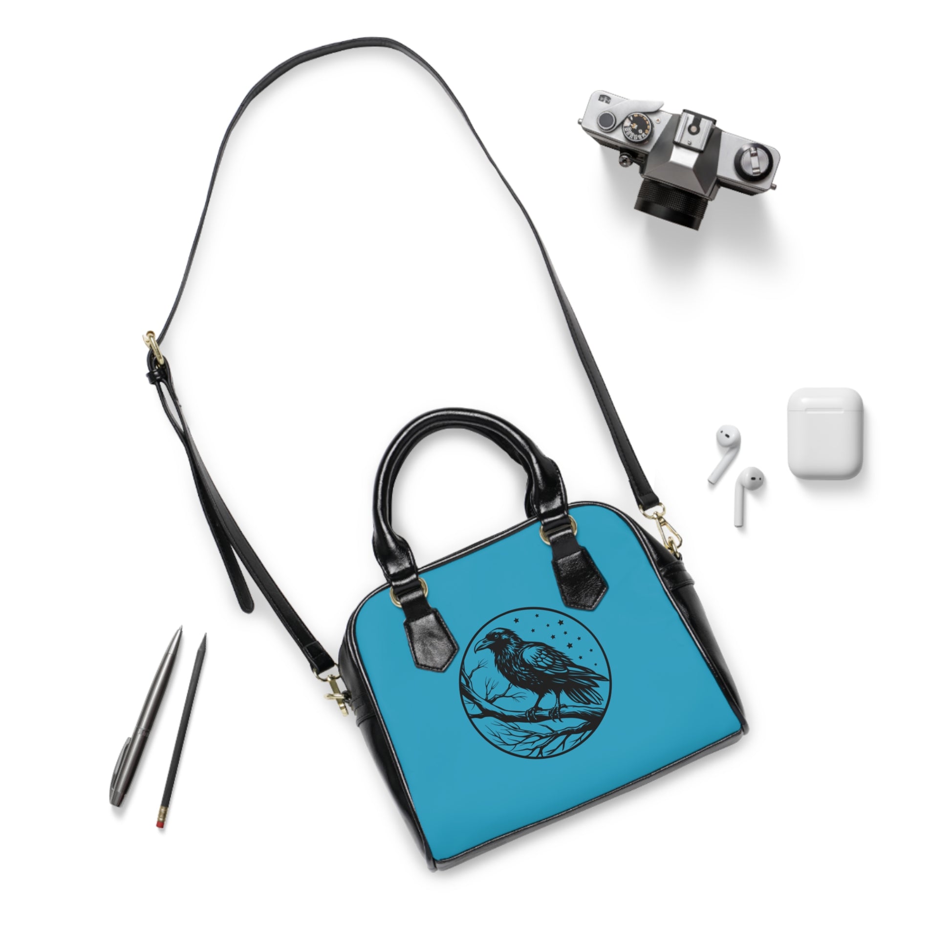 Gothic shoulder bag with raven design and azure accents - alternative fashion handbag featuring mystical dark style with blue details