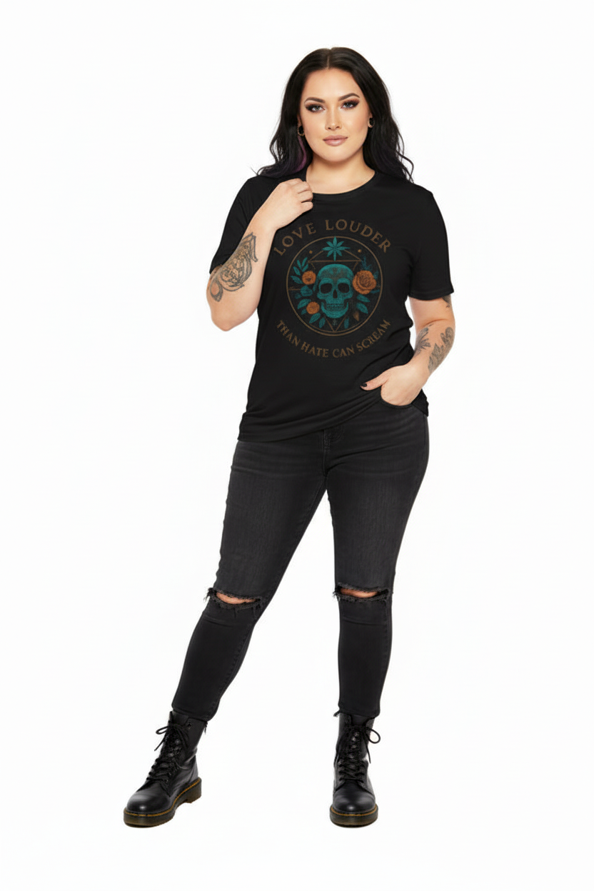 Woman wearing a black t-shirt with a graphic design and black pants on a white background