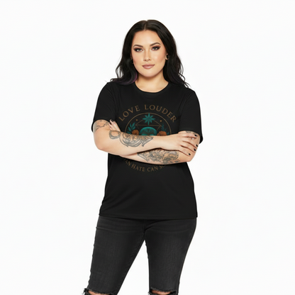 Woman wearing a black t-shirt with 'Love Louder' text on a white background