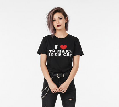 Person wearing a black t-shirt with text and a heart symbol on a white background