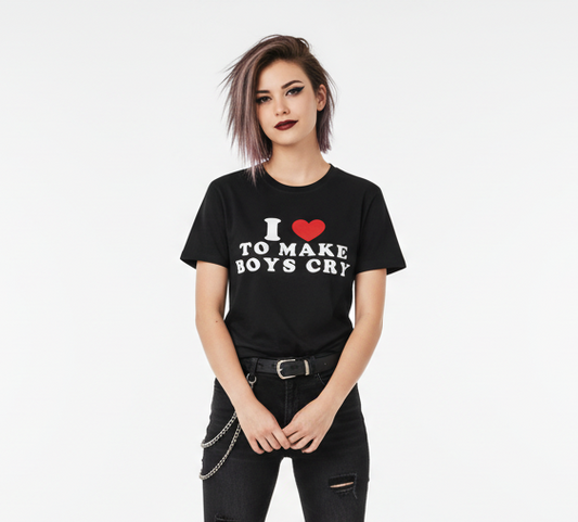 Person wearing a black t-shirt with text and a heart symbol on a white background