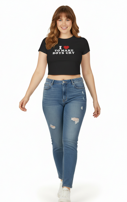 Woman wearing a black t-shirt with text and blue jeans on a white background