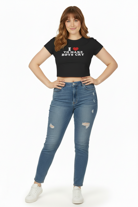 Woman wearing a black t-shirt with text and blue jeans on a white background