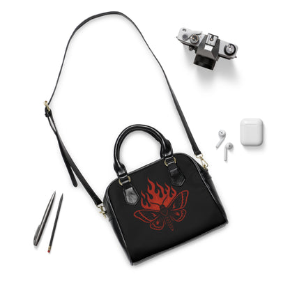 Cinderflight gothic handbag with fiery moth motif

Alternative fashion moth handbag in dark tones