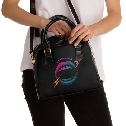 Loudmouth gothic handbag with bold motif
Alternative fashion punk rock handbag in structured silhouette
Edgy gothic purse with Loudmouth graphic design
