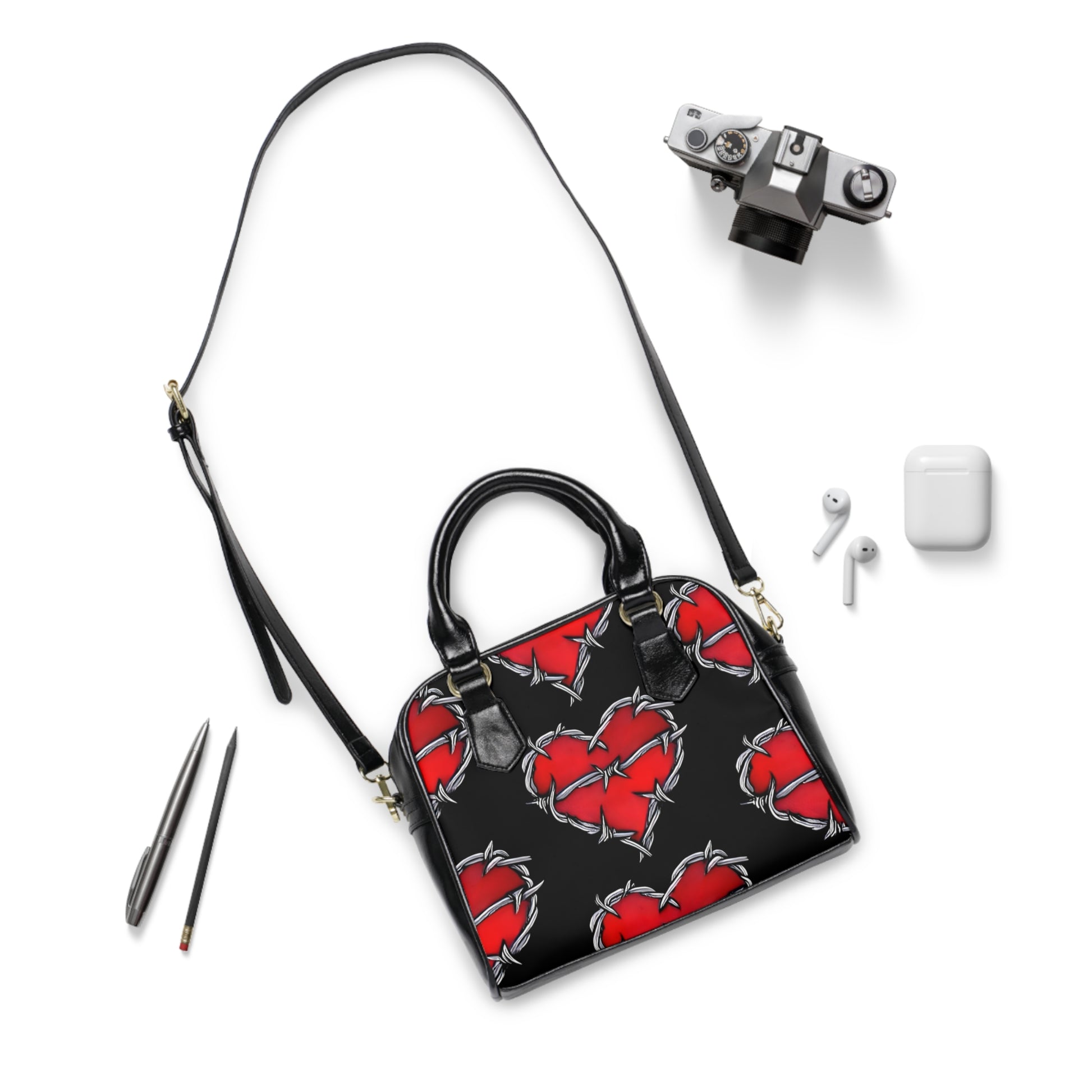 Barbed Heart gothic handbag with barbed-wire motif

