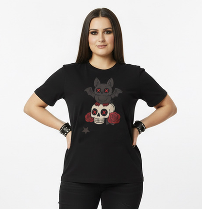 Woman wearing a black t-shirt with a graphic goth bat design on a white background