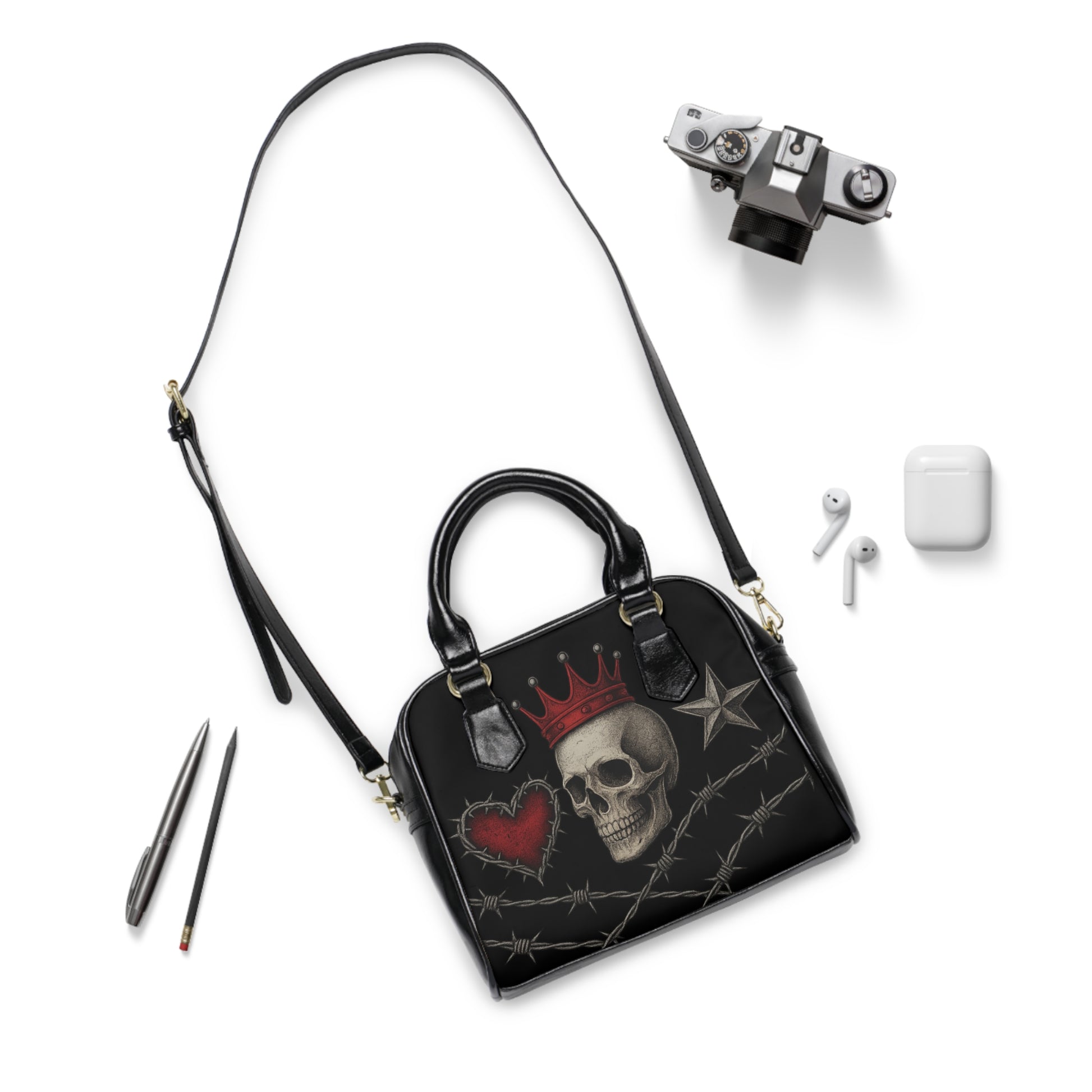 Skull Reign gothic handbag with skull design

Black rocker style tote with skull details

Edgy gothic fashion handbag Skull Reign