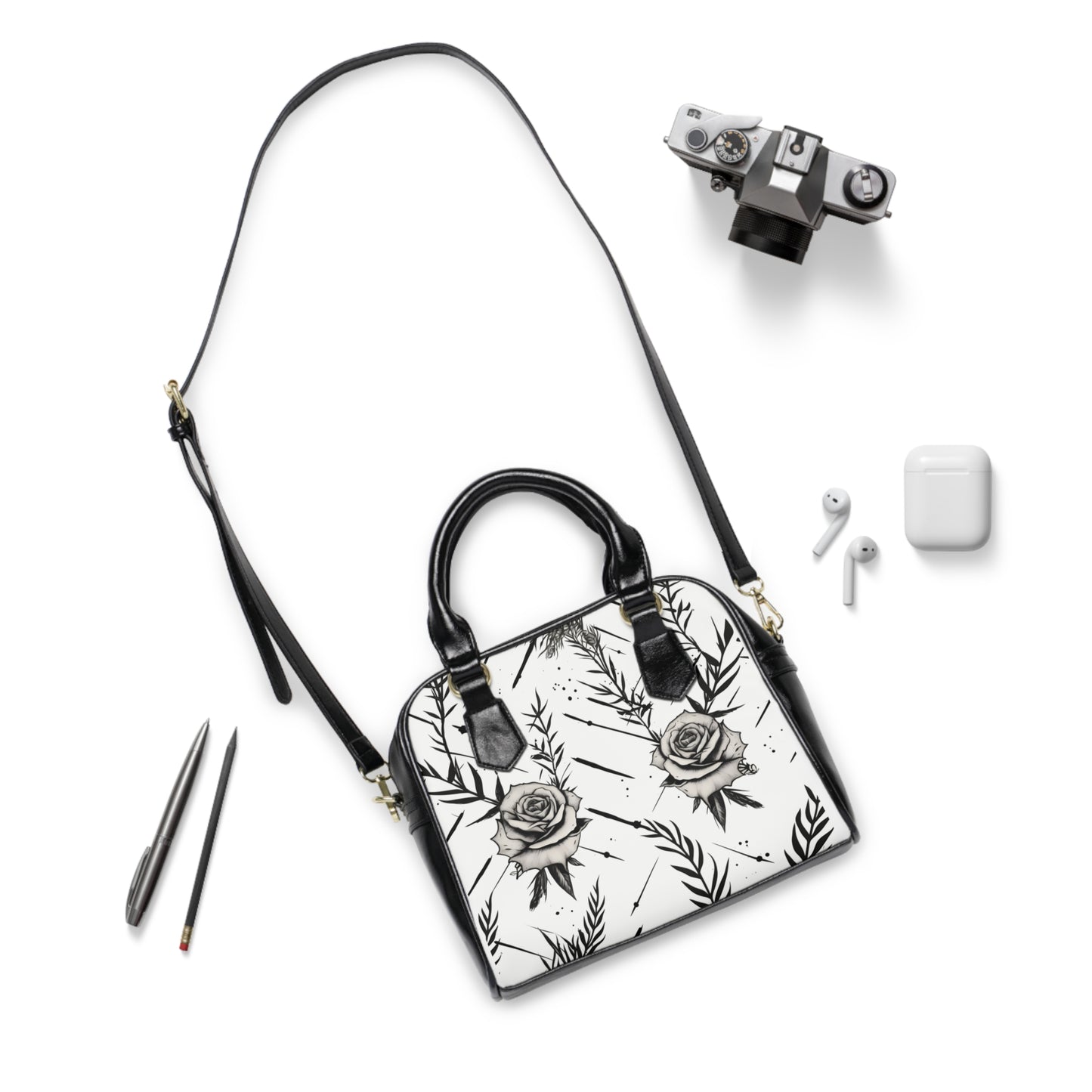 Gothic shoulder bag with thorned rose design - alternative fashion handbag featuring dark floral pattern with edgy thorns and romantic blossoms