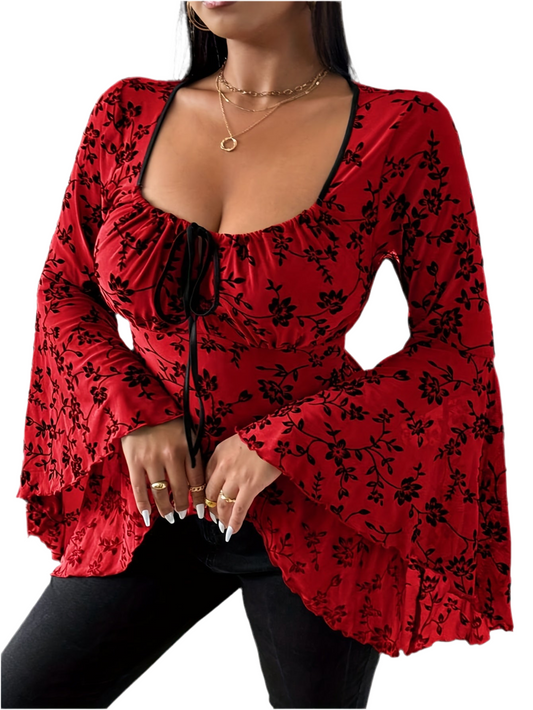 Blood Blossom gothic floral top with puffed sleeves and bows
Alternative fashion gothic blouse in crimson floral print
Edgy punk rock top with gothic romantic elegance
