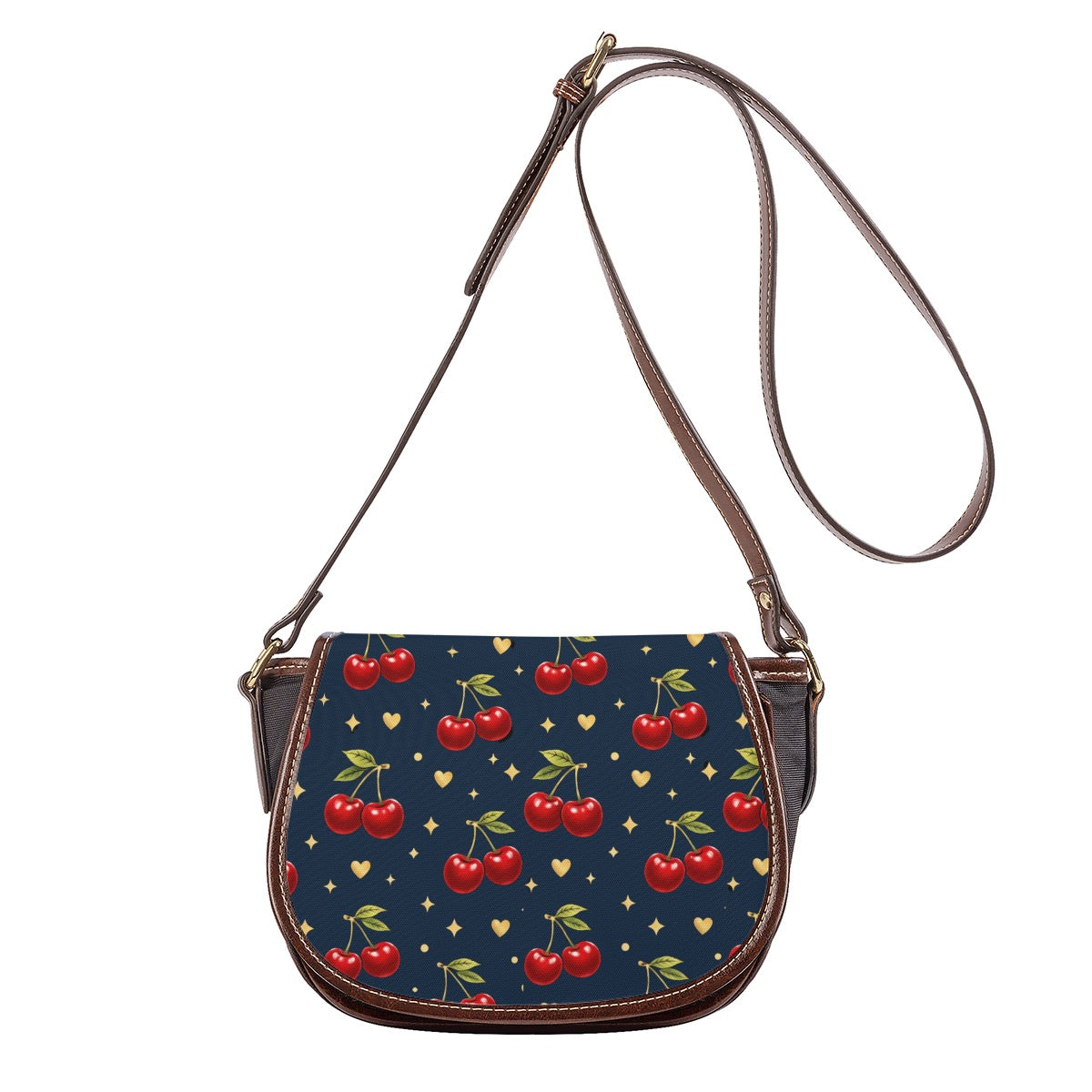Front view of navy cherry print saddle bag crossbody with adjustable shoulder strap and brown trim.