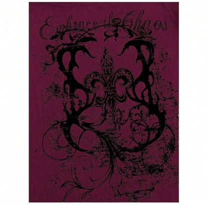 Close-up of distressed black fleur-de-lis graphic and text design.