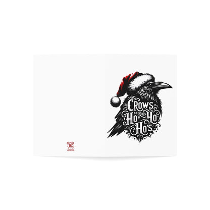 Illustration of a crow wearing a Santa hat with text on a white background