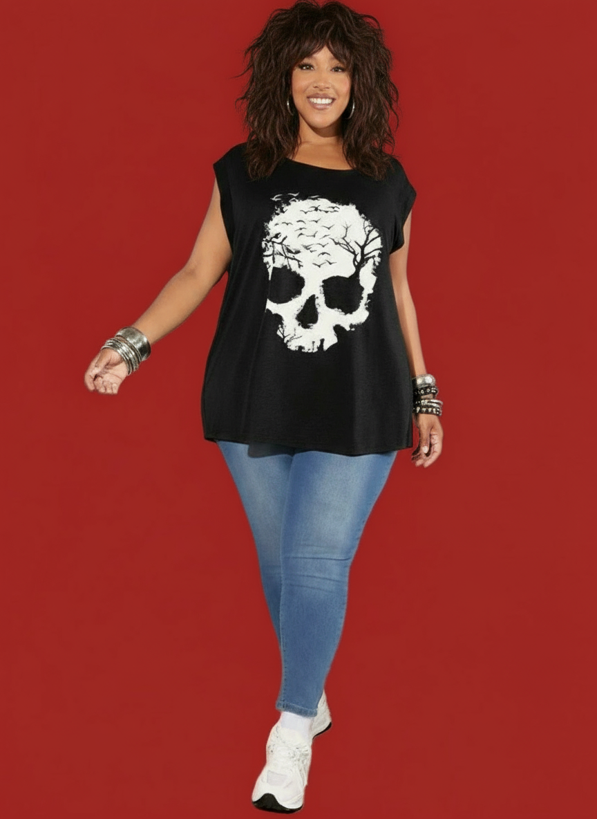 Person wearing a black sleeveless top with a skull design and blue jeans on a red background