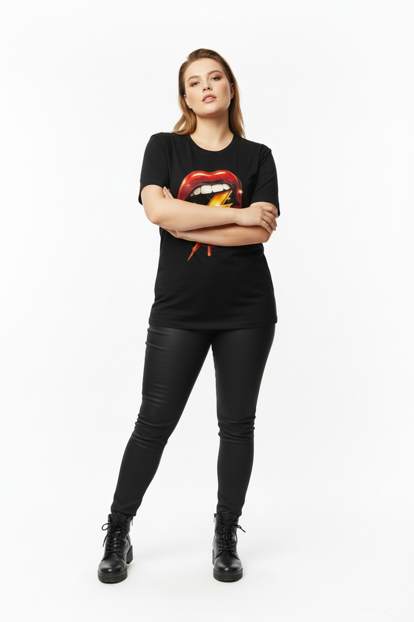 Woman wearing a black t-shirt with a graphic design on a white background