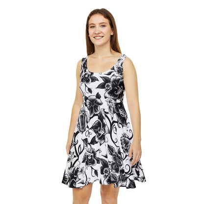 Dark Enchantress gothic dress in flowing black silhouette
Gothic skater dress with tattoo flower print
Alternative fashion dress with floral skull tattoo motif