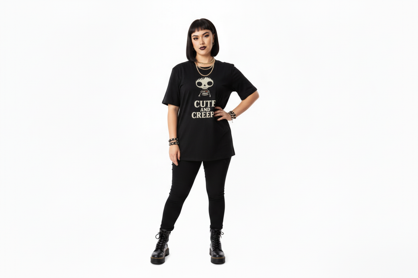 Person wearing a black t-shirt with text and graphics on a white background