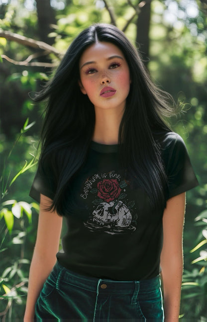 Alternative fashion model wearing Everything is Fine tee paired with ripped black jeans and combat boots