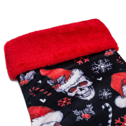 Calcetín navideño con calaveras de Papá Noel