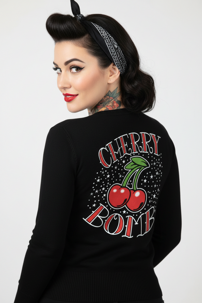 Woman wearing a black sweatshirt with 'Cherry Bomb' design on a white background